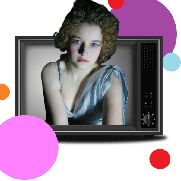 Tight White-Blonde Curls Of Julia Garner