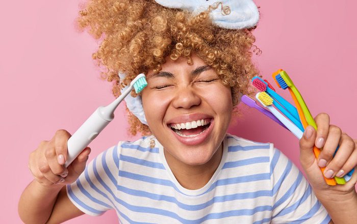 From Ancient Chewing Sticks To High-Tech Devices — The Evolution Of Toothbrushes